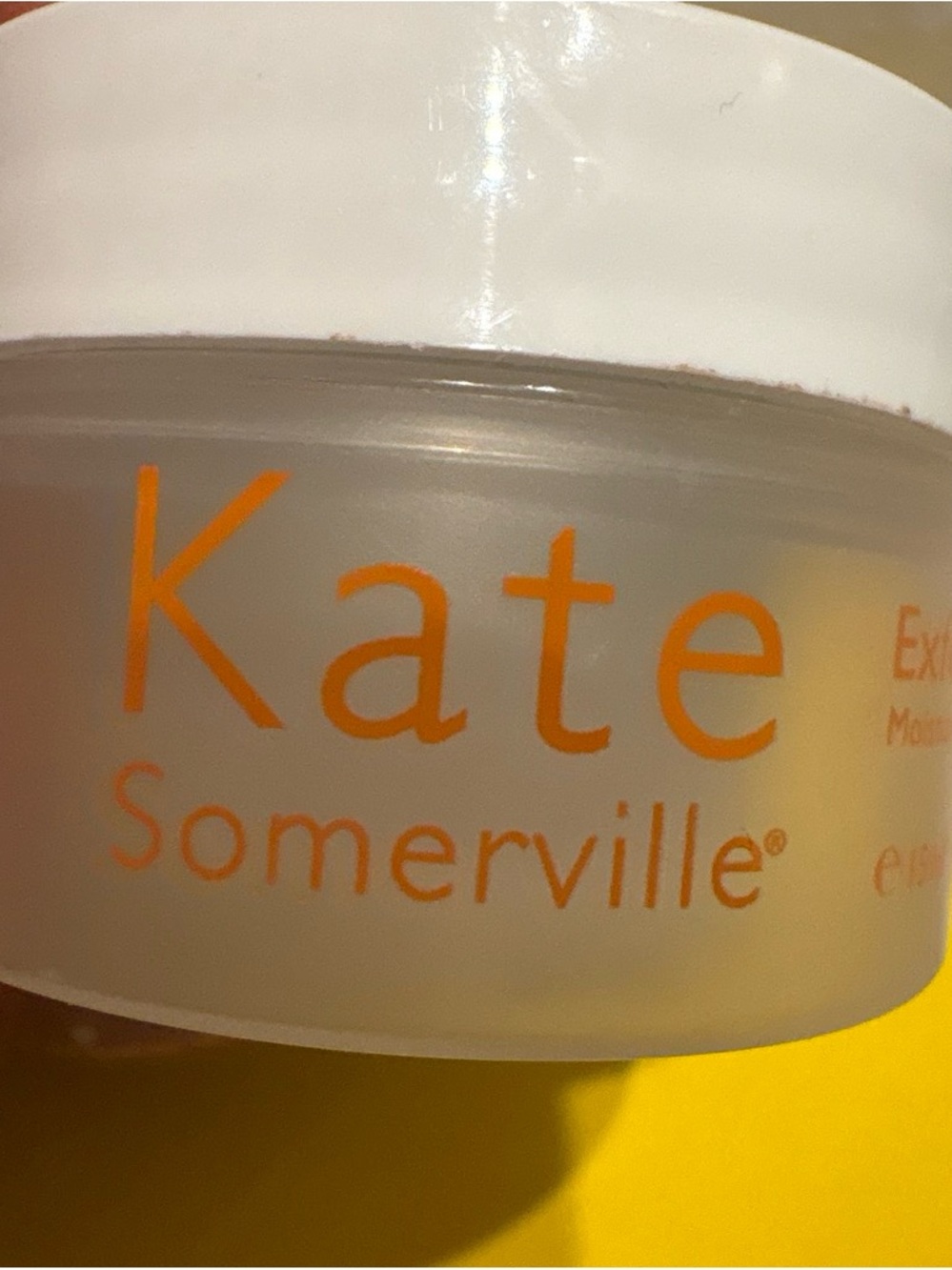 Kate Somerville Jar with Orange Logo and White Lid